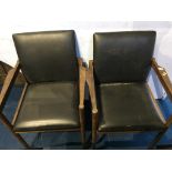 A pair of Vanson teak carver chairs