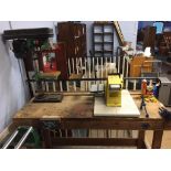 A work bench, sander and a drill