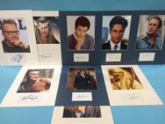 Assorted mounted photos and signed cards, to include Fabio, George Chakiris, Johnathan Silverman,