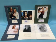 Assorted mounted photos and signed cards, to include Jaclyn Smith, Jacqueline Bisset, Kirsten Dunst,