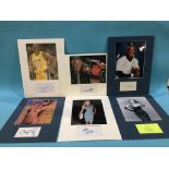 Assorted mounted photos and signed cards, to include Daryl Strawberry, Mario Andretti, Shaquille O'