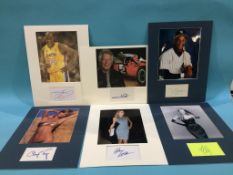 Assorted mounted photos and signed cards, to include Daryl Strawberry, Mario Andretti, Shaquille O'