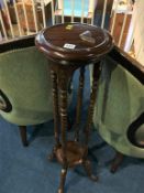 A mahogany pedestal