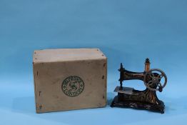 A boxed Selfridges of London German child's sewing machine