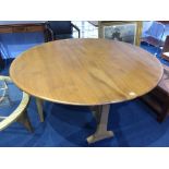 An Ercol Golden Dawn drop leaf dining table, 140cm wide
