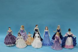 Nine Royal Doulton figurines and a Coalport figure