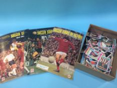 A collection of football collectors cards