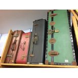 A quantity of trunks and suitcases