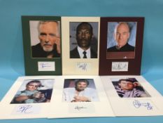 Assorted mounted photos and signed cards, to include Eddie Murphy, Dennis Hopper, Patrick Stewart,