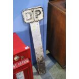 A railway cast iron D. P. sign post