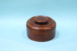 A turned wooden circular box and cover, labelled Aero-Art Product, made from propellers of the war