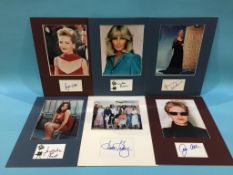 Assorted mounted photos and signed cards, to include Linda Evans, Donna Dixon, Juliette Binoche,