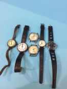 A collection of various vintage wristwatches