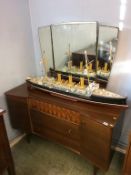 A teak dressing chest