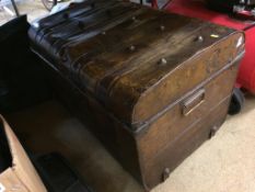 A tin steamer trunk