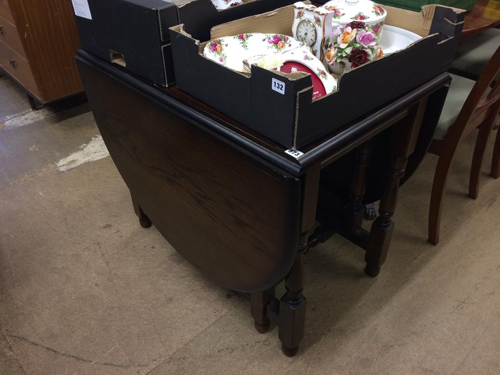 An oak gateleg table