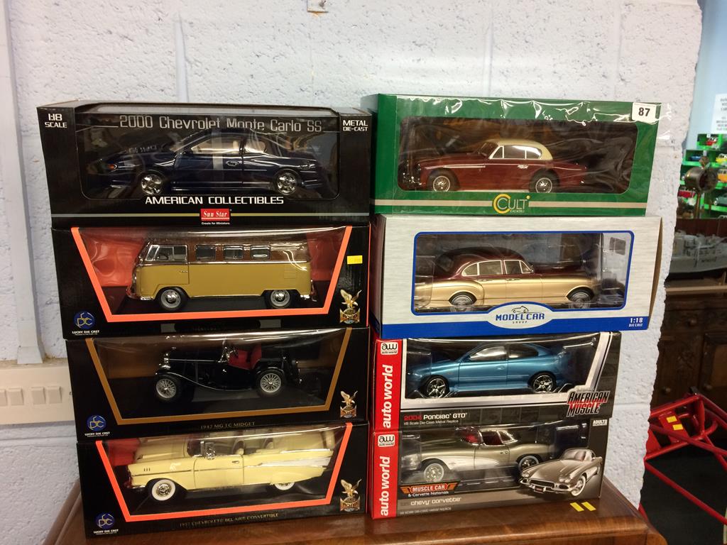 Eight boxed Die Cast cars