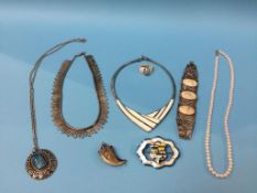 A sterling silver and enamelled brooch and a quantity of costume jewellery