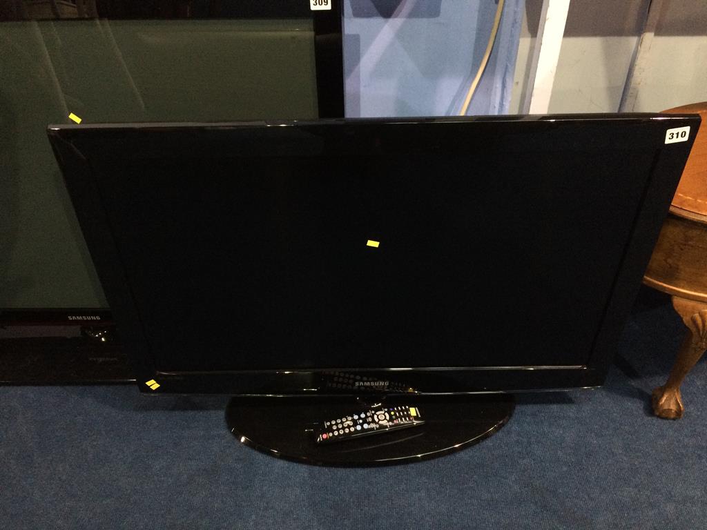 A Samsung TV, with remote