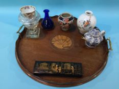 An Edwardian mahogany circular two handled tray etc.