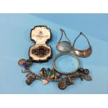 A bag of assorted silver, to include decanter labels, charm bracelet etc.