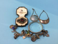 A bag of assorted silver, to include decanter labels, charm bracelet etc.