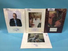 Assorted mounted photos and signed cards, to include McCauley Culkin, Mary Tyler Moore, The Adams