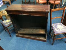 A pair of Edwardian chairs and a rosewood bookcase