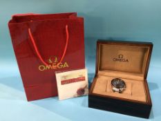 A boxed Gents wristwatch, copy of an Omega watch