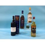 A bottle of Armagnac (boxed), Southern Comfort, Pure Malt Whisky, Taylors 2000 Port and a bottle