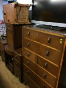 An oak chest of drawers, dressing table etc.