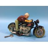 Tin Plate, an Arnold Mac 700 wind up Motorcycle and Rider, Germany