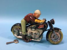 Tin Plate, an Arnold Mac 700 wind up Motorcycle and Rider, Germany