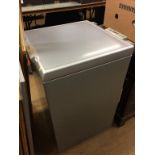A silver Whirlpool chest freezer