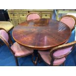 An Italian style circular table and four chairs