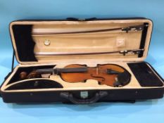 A violin labelled Veracini, together with two bows, one by Juliano Oliveira, in fitted hard case