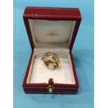 An 18ct Cartier 'Trinity' ring, boxed, size 'L', 8g