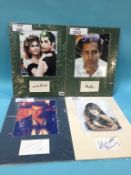 Assorted mounted photos and signed cards, to include Martin Sheen, Maximillion Schell, John