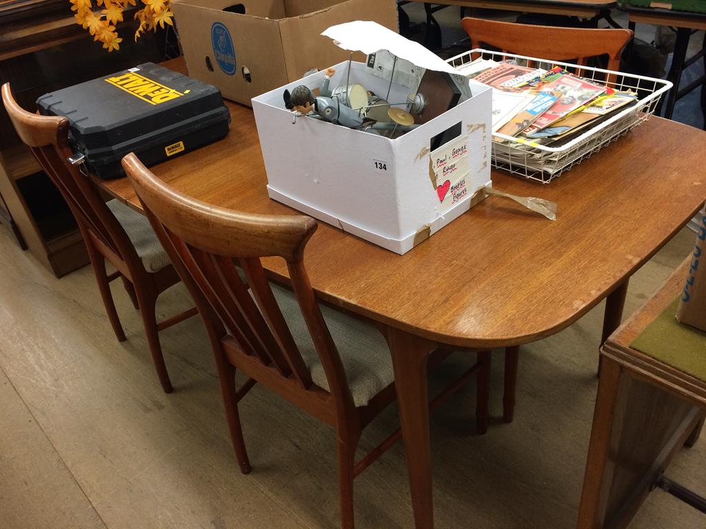 A Mackintosh teak table and four chairs