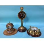 A reproduction Ships clock, a clock inset into a Divers helmet and a Ships Telegraph lamp (3)