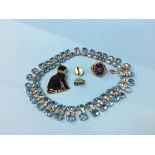 A decorative necklace, Cat brooch, enamelled ring and a pair of clip earrings