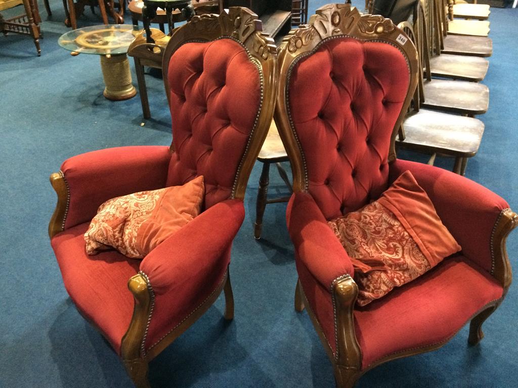 A pair of reproduction button back nursing chairs