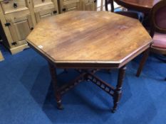 An Edwardian oak octagonal table