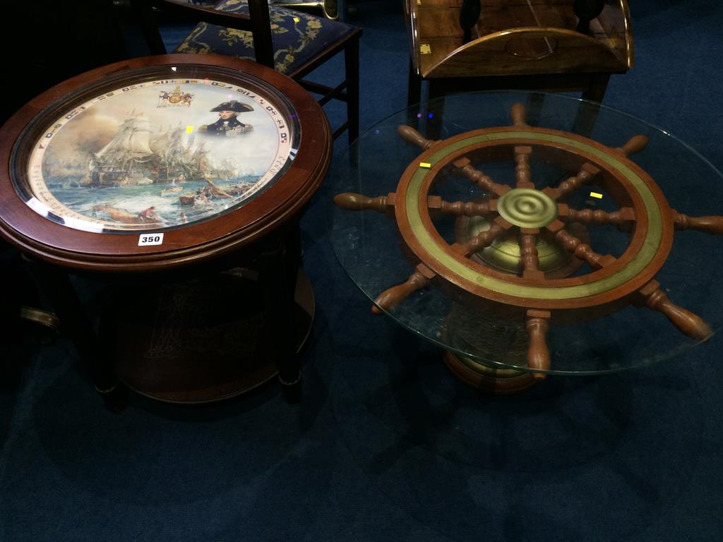 A Ships wheel coffee table and a Duke of Wellington coffee table (2)