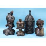 Four Tribal heads, 19.5cm wide x 40cm long, 14cm wide x 27cm long, 17cm wide x 42cm long, 14cm