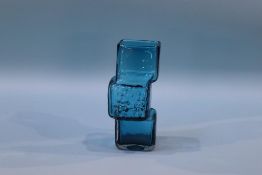 A small Whitefriars kingfisher blue Drunken Bricklayer glass vase by Geoffrey Baxter, 19cm height