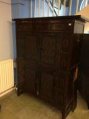 An Oriental four door cabinet, 135cm wide