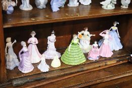 Eleven Coalport figures