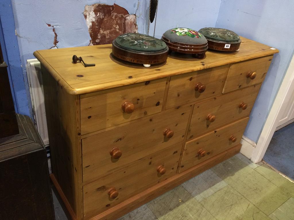 A pine chest of drawers