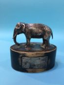 A silver elephant, Alexander Clark and Co Ltd, London, 1932, on ebonised base, approx. 10cm tall